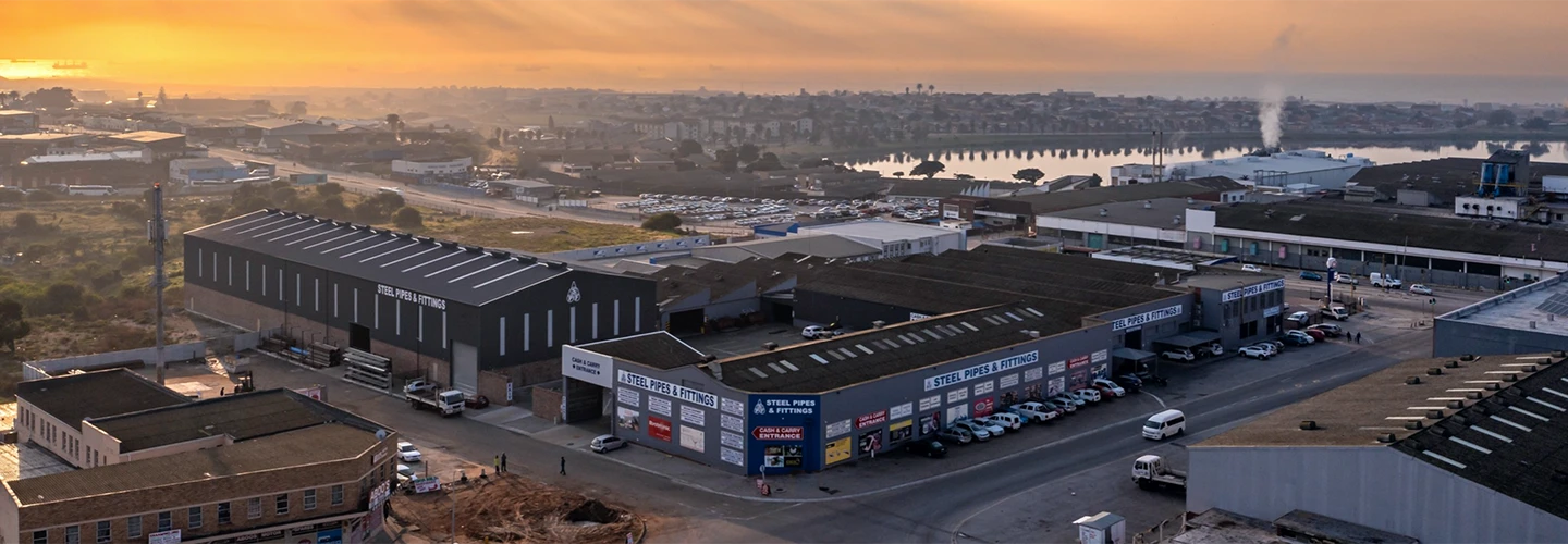 Aerial view of the Steel Pipes & Fittings premises in Korsten at sunrise